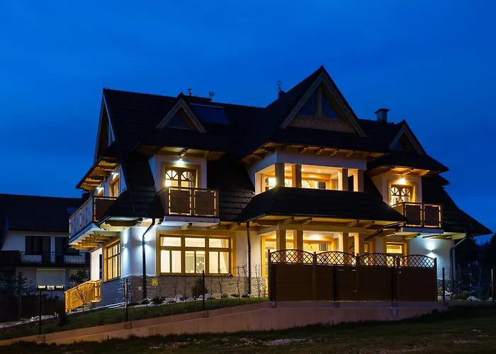 Domek za Strugiem - pokoje i apartamenty